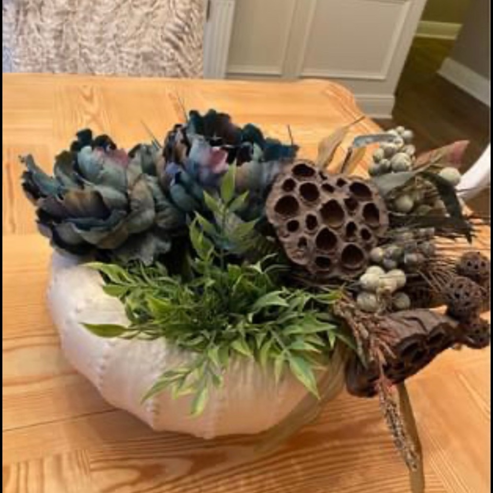 Floral Arrangement in white pottery. Faux floral
